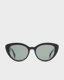 Black cat-eye sunglasses with green lenses
