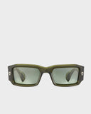 A pair of green acetate sunglasses with silver decorations on the front and a 7-barrel hinge.