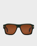 A pair of square-framed sunglasses with a two-tone enamel detail, hypoallergenic nose pads, and tinted lenses.